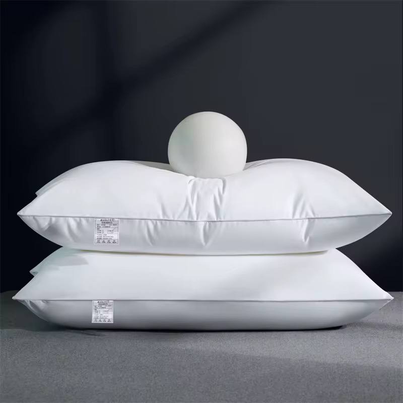 Compressed white comfy pillows.