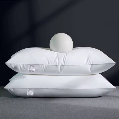 Compressed white comfy pillows.
