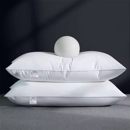Compressed white comfy pillows.