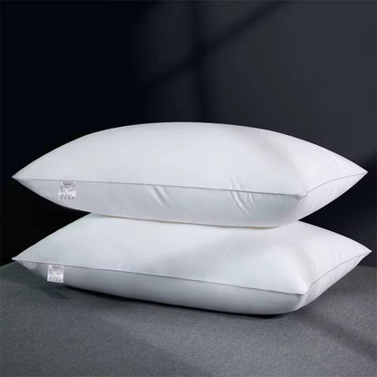 Compressed white comfy pillows.