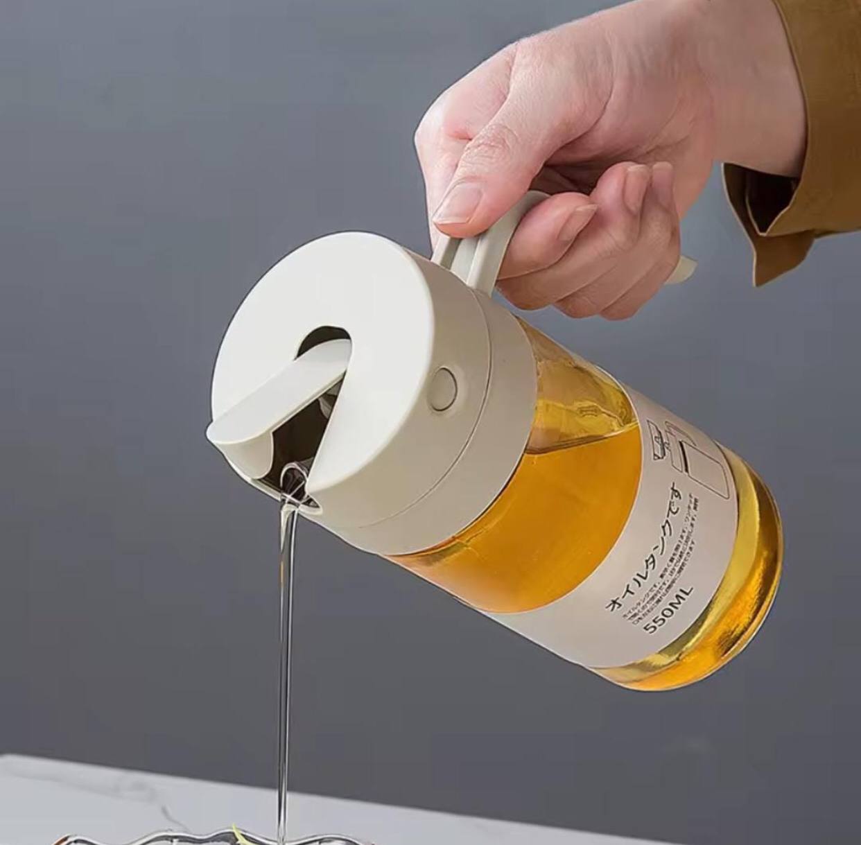 Automatic glass oil jar/dispenser